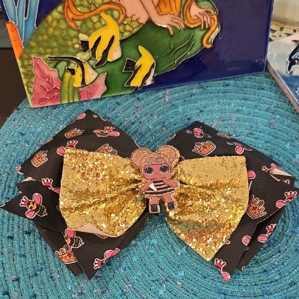 Gold LOL Girl Glitter Bow with Black Pattern